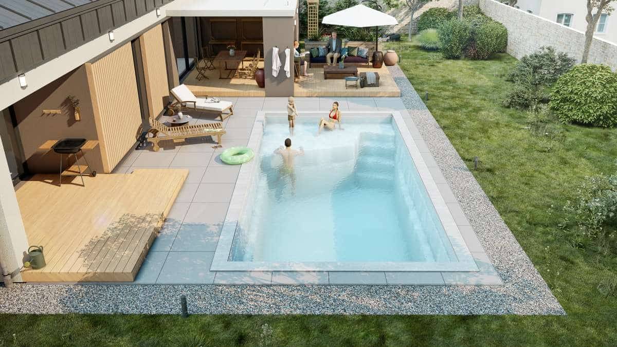 Installation d’une piscine coque rectangulaire avec plage immergée à Belleville en Beaujolais